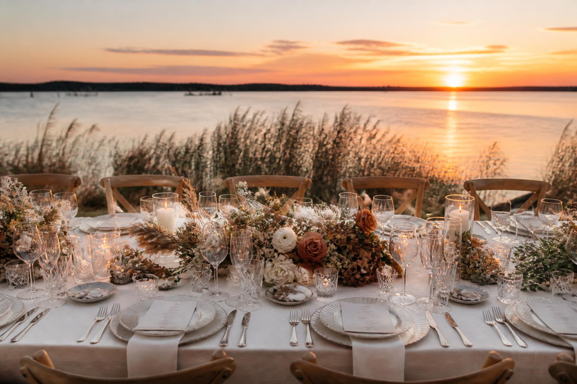 Elegant waterfront dinner on a Chesapeake Bay estate at sunset